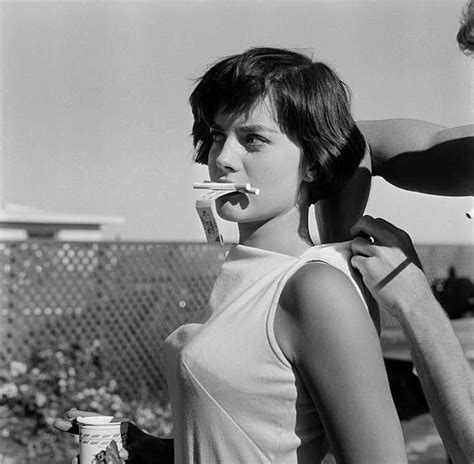 Actress Natalie Wood Poses With Cigarettes In Her Mouth At