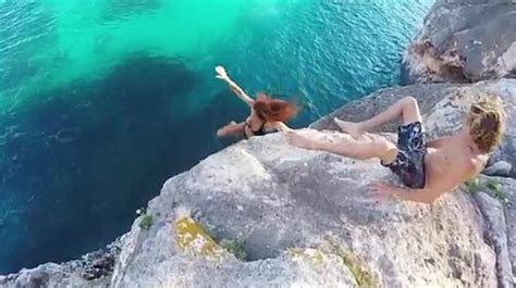 Video Man Refuses To Help Girlfriend Lets Her Fall Off Cliff Video Man Refuses To Help