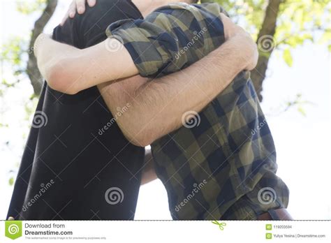 Two Men Hugging Each Other Stock Photo Image Of Kiss