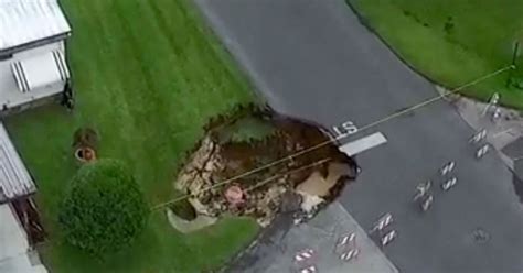 Couple Evacuated After Enormous Sinkhole Opens Up Outside Their Home World News Mirror Online