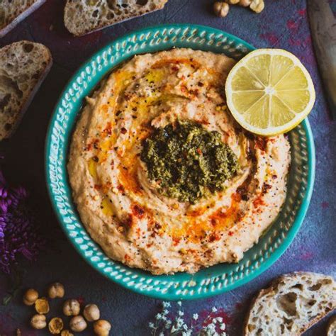 Creamy Smooth And Delicious Homemade Sun Dried Tomato Hummus Topped