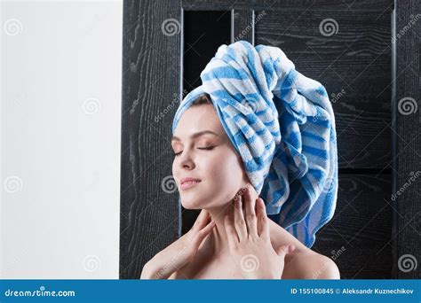 Beautiful Girl After A Shower With A Towel On Her Head Stock Image