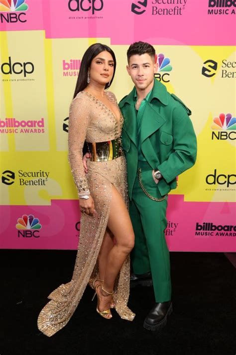 Priyanka Chopra Stuns In A Sheer Nude Plunge Dress With Nick Jonas At The Billboard Music