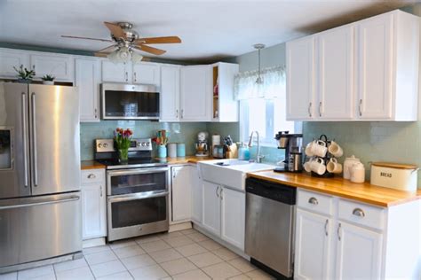 Now to continue with my kitchen transformation we've added crown molding to the top of the cabinets. Adding crown molding to your kitchen cabinets. - Weekend Craft