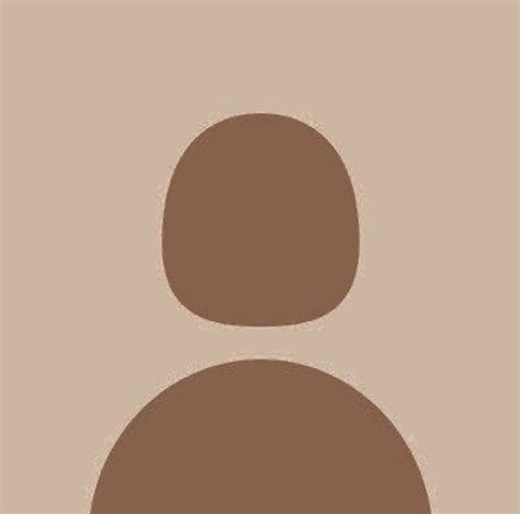 An Image Of A Persons Face In The Middle Of A Brown And Tan Background