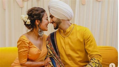 Neha Kakkars Haldi Ceremony Pictures Go Viral Singer Looks Radiant In Yellow Dress Filmibeat