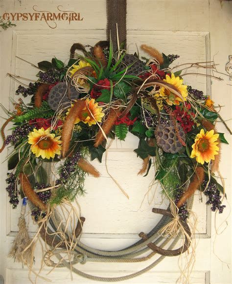 Decorate your home or country western cabin in rustic western accessories like distinctive figurines and pottery, decorative vases, western cowboy and southwestern decor accents. Rope Wreath with Horseshoes Cowboy Western Home Decor On