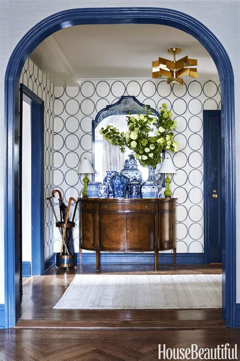 Navy Trim Is The Clever Trick That Brings This Apartment Together
