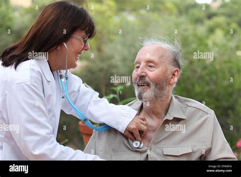 Dr With Stethoscope Checking Senior Patients Heat Beat Stock Photo Alamy