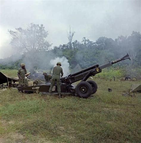 Vietnam War 1966 Us Army Soldiers Firing An M102 Howitzer