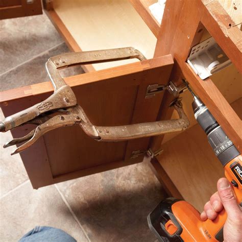 If it is a new door/cabinet, its size should give you an idea of what kind and size of the hinge you need. My Favorite Cabinet-Hanging Tool | Installing kitchen ...
