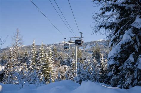 Ski Gondola Lift In Mountains Ski Attraction Mountains Winter Landscape View Stock Photo