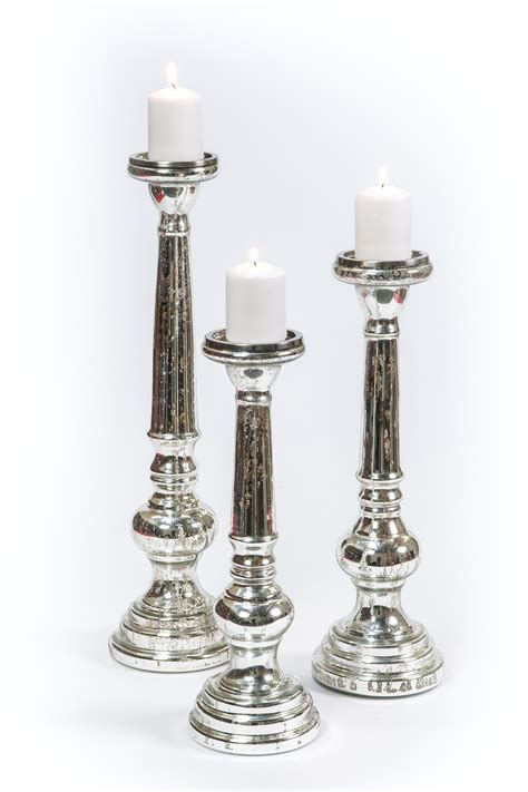 These pewter candle wall sconces constitute a great example of vintage design. Antique Silver Mercury Glass Candle Holder - Globe Enterprise