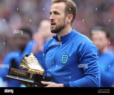 Harry Kane Of England Poses With Their Golden Boot Trophy During Uefa