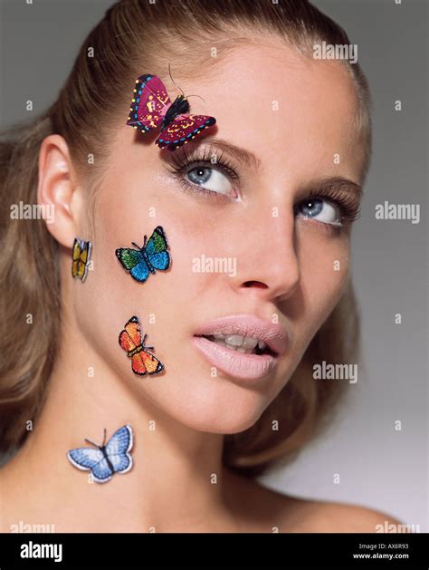 Woman With Butterflies On Her Face Stock Photo Alamy