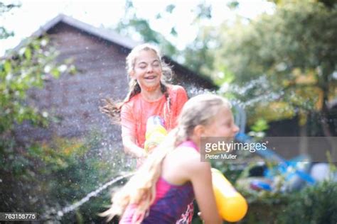 Two Girls Squirting Photos Et Images De Collection Getty Images