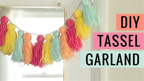 Are you looking for some frugal christmas or winter decor ideas for your house? Easy DIY Yarn Tassel Garland Tutorial | Diy tassel garland ...
