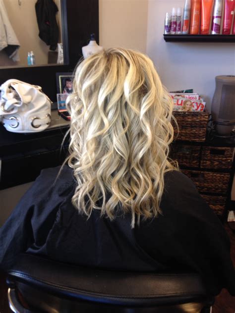 You can wear it straight or curled, and the color will require very minimal maintenance! Blonde Highlights, curls, medium length hair | Medium ...