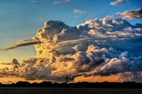 Cumulonimbus clouds storm winter rain clouds sunset tornadoes gray earth water wind strong fast ...