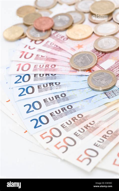 Euro Bills And Coins Stock Photo Alamy