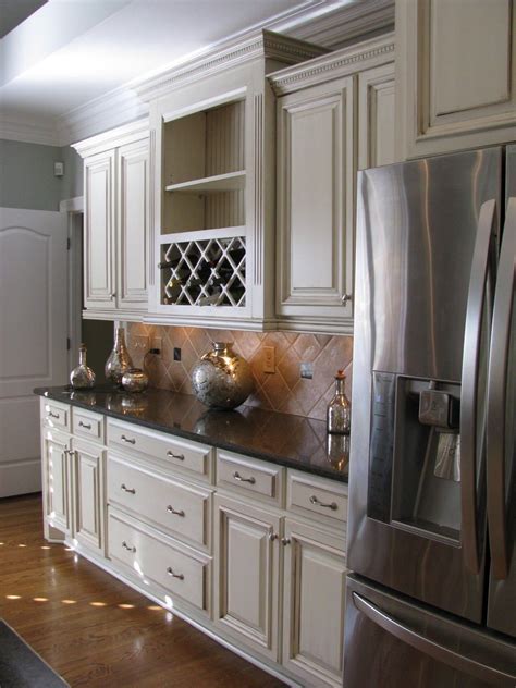In addition, rustic white kitchen cabinets also work best in small kitchen spaces as they create an illusion of a bigger space. Beautiful off white cabinets with dark brown glaze | Off ...