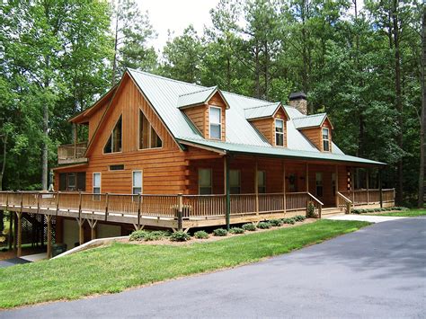 Many of our log siding customers install the siding. Modular cabin with split log siding by Nationwide Homes ...
