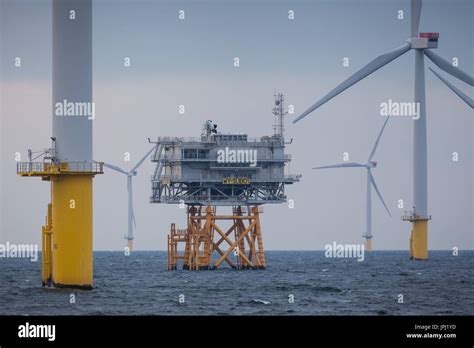 The Substation And Turbines On Walney Offshore Wind Farm Off The