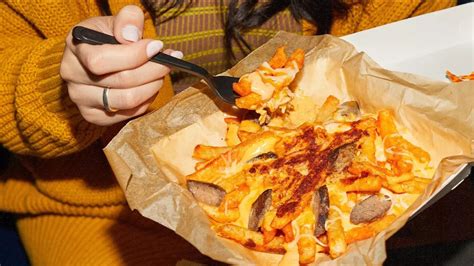 Taco Bell Is Bringing Grilled Cheese Nacho Fries To The Menu For A