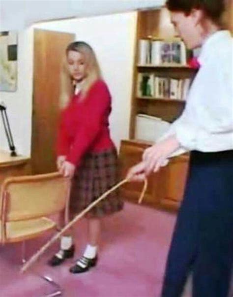 this girl will have a harsh lesson after bending over for the cane in the headmistress office