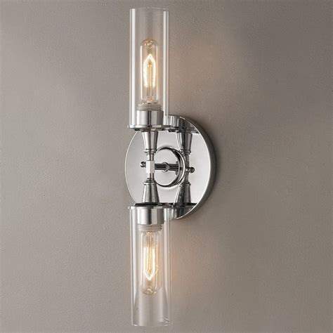 Wall sconces make an attractive addition to a bathroom lighting plan when used as an additional source of general lighting. Double Bullet Glass Wall Sconce | Glass wall sconce, Wall ...