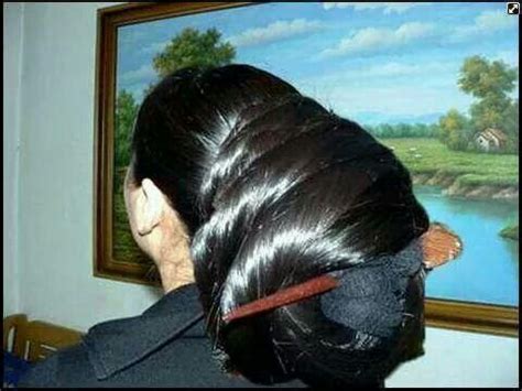 A low, loose bun for long hair is a great option for disguising your hair elastic. 29 best images about Big hair bun on Pinterest | Tibet ...
