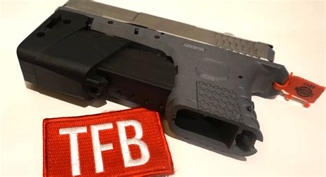 Full Conceals Folding Glock Akin To Magpuls Fmg9 The Firearm Blog
