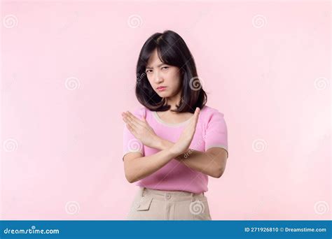 Portrait Serious Young Asian Woman With Cross Arm Gesture Showing Stop