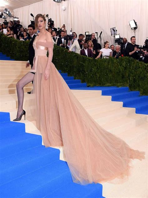 Gigi Hadid Spices Up Champagne Gown With Fishnet Tights At The Met Gala Met Gala Dresses