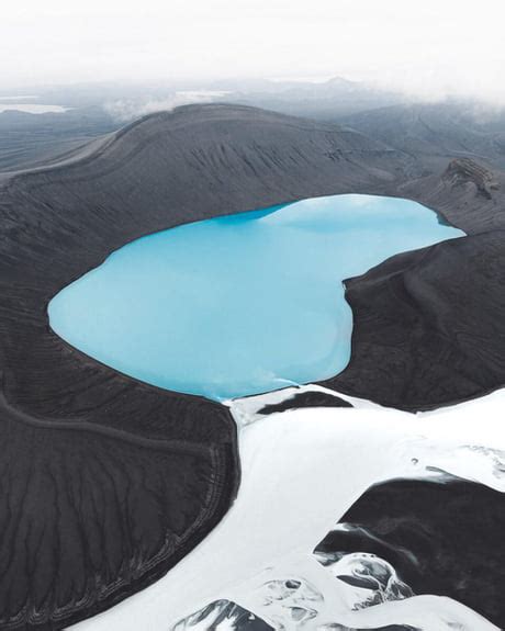 The Intersection Of Crater Lakes And Glaciers In Icelands Majestic