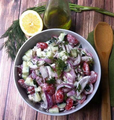 Yogurt ranch cucumber salad is sure to become your new favorite cucumber salad! Cucumber Tomato Salad with Dill Yogurt Dressing - A Cedar ...
