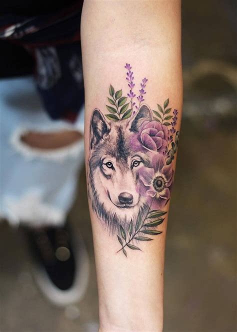 21 Of The Best Wolf Tattoo Designs For Women Petpress Wolf Tattoos