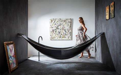 This type is easiest to clean but it can be difficult to fit through the bathroom door; Bathtub «Vessel» by Splinter Works