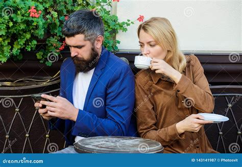 Using Phone While Date Morning Coffee Woman And Man With Beard Relax In Cafe Couple In Love