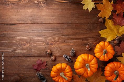 Autumn Thanksgiving Background Pumpkins Acorns And Leaves On Rustic