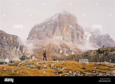 Hiker Walking Mount Lagazuoi In Background Dolomite Alps South Tyrol