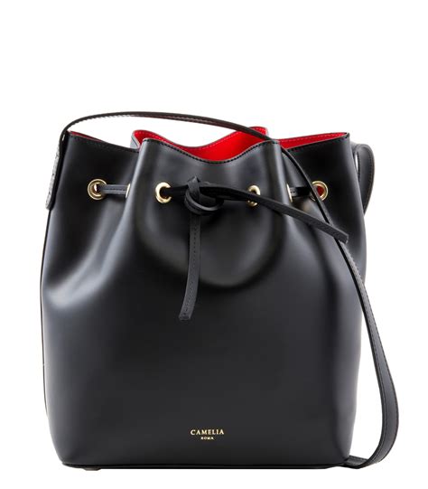 The use of bags predates recorded history, with the earliest bags being no more than lengths of animal skin, cotton, or woven plant fibers. Leather bucket bag - Camelia Roma