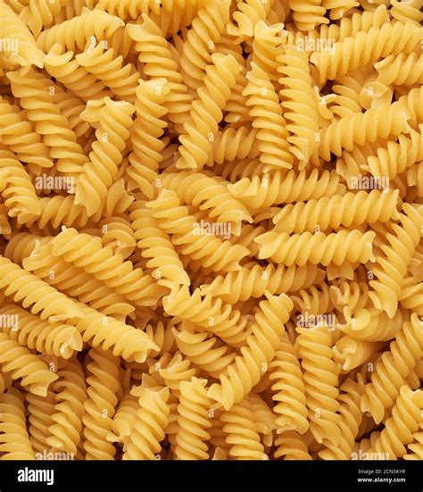 A Bunch Of Raw Fusilli Pasta Top View Full Frame Stock Photo Alamy