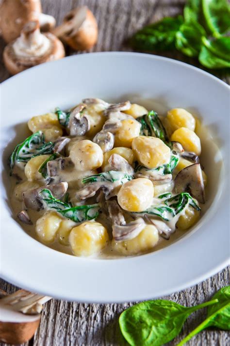 This creamy mushroom and spinach gnocchi recipe is so saucy, flavorful and super easy to make ...