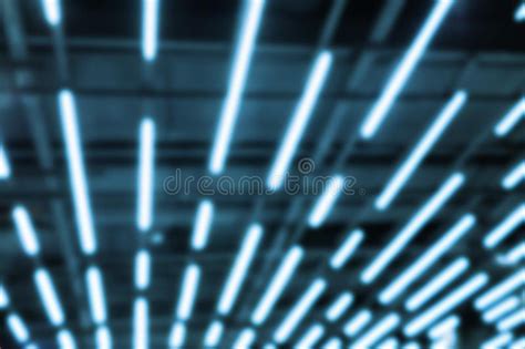 Abstract Blurred Blue Neon Led Light Lamp Stripes On Mall Ceiling Or