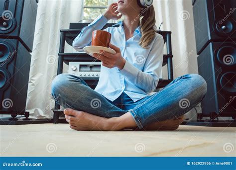 Woman Listening To Music From A Hi Fi Stereo Stock Photo Image Of