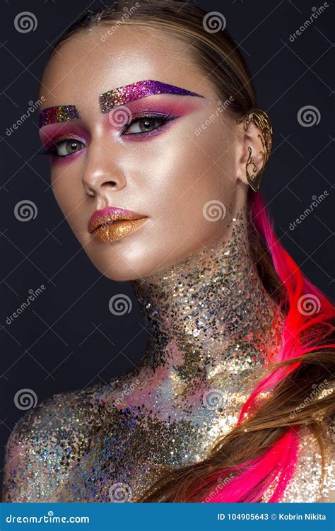 Beautiful Girl With Creative Glitter Makeup Sparkles Unusual Eyebrows
