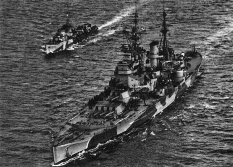 Aerial View Of A King George V Class Battleship With An Accompanying