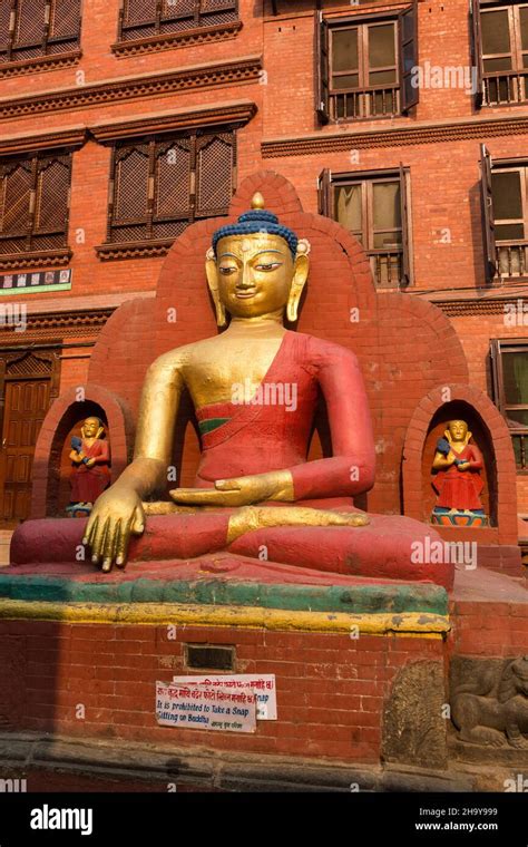 A Statue Of Buddha In The Swayambhunath Temple Complex In Kathmandu