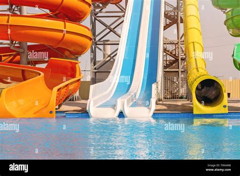 Multicoloured Big Water Slide In The Public Swimming Pool Stock Photo